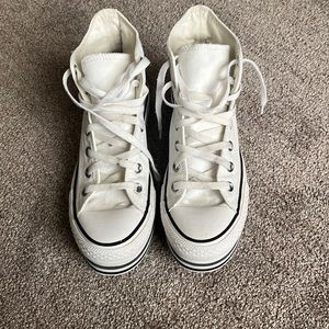 White high top platform converse.